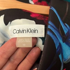 Calvin Klein scuba sheath floral, dress with gold zipper in the back. Used.